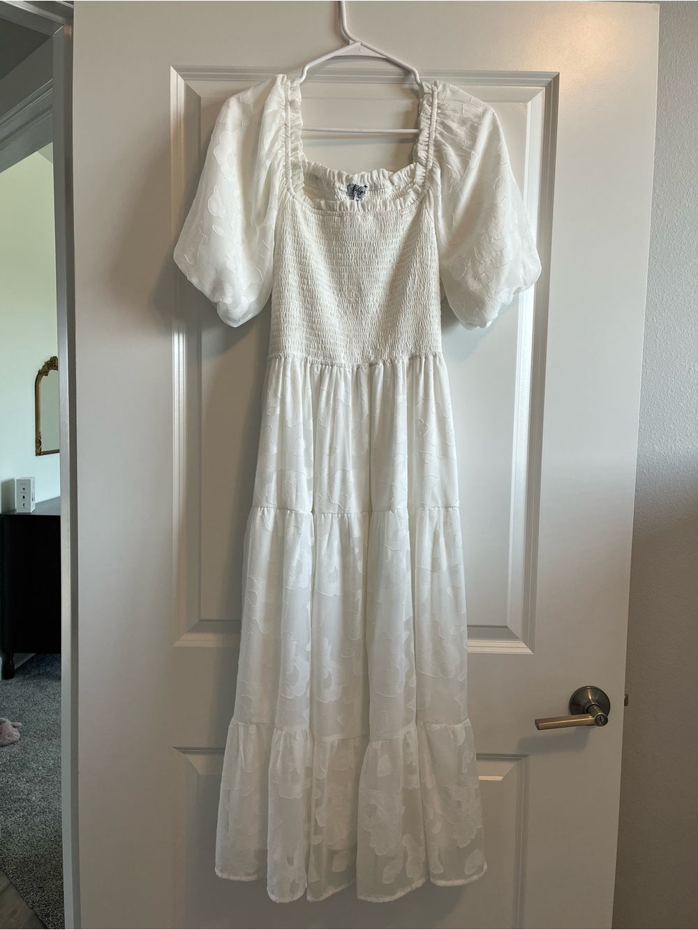 White smocked puff sleeve dress. M.